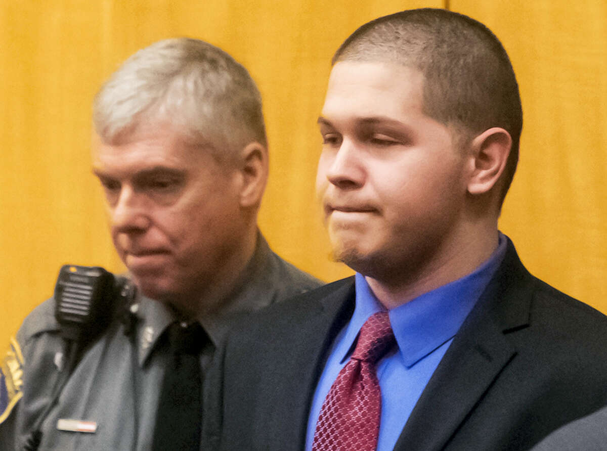 Tony Moreno, right, enters the courtroom during his murder trial Feb. 15 in Middletown.