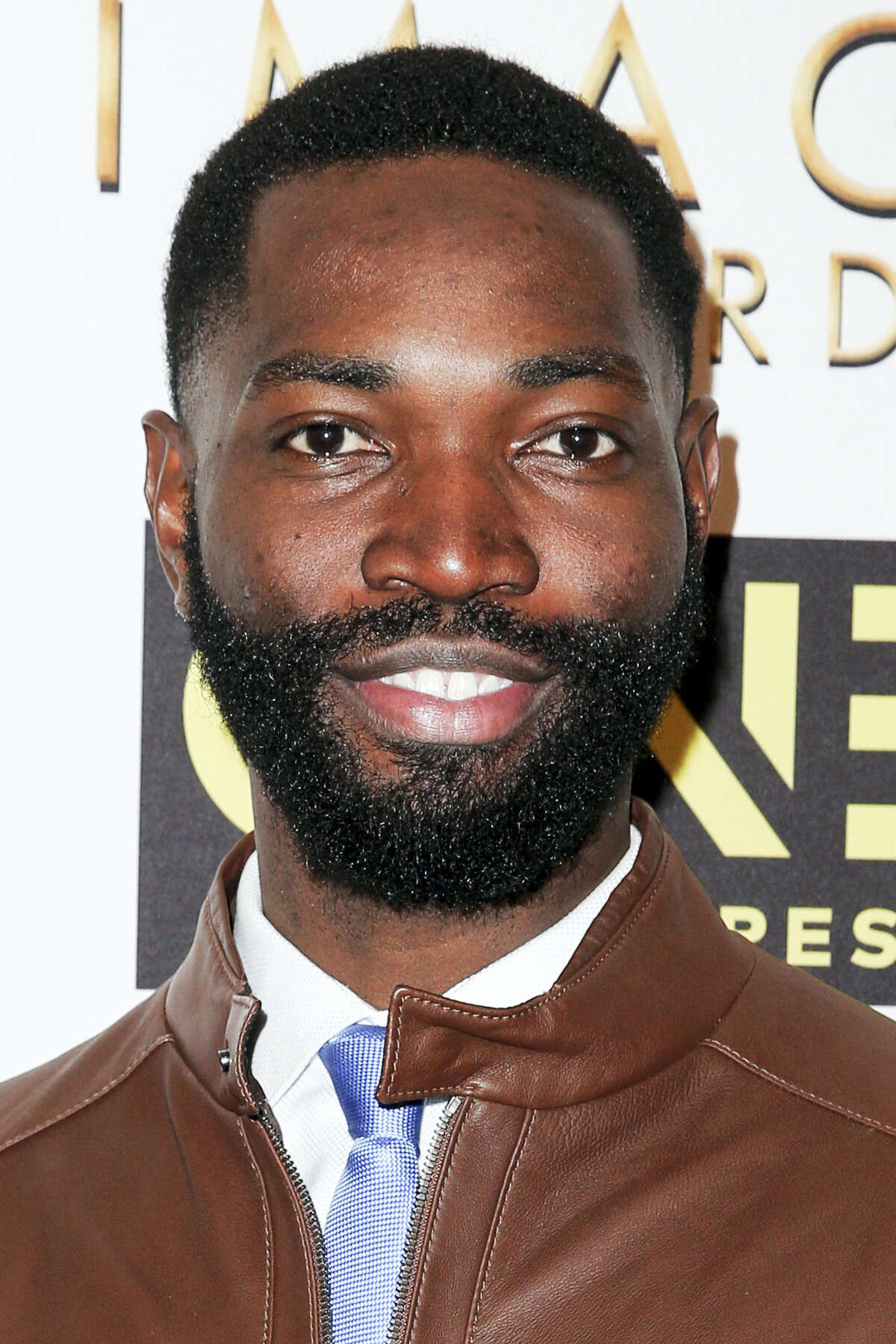 In this Jan. 28, 2017 photo, Tarell Alvin McCraney arrives at the 48th NAACP Image Awards Nominees’ Luncheon at the Loews Hollywood Hotel in Los Angeles. McCraney, the playwright who inspired the Oscar-nominated movie “Moonlight” won a prize from PEN America, the award for best mid-career playwright, PEN announced on Feb. 22, 2017.