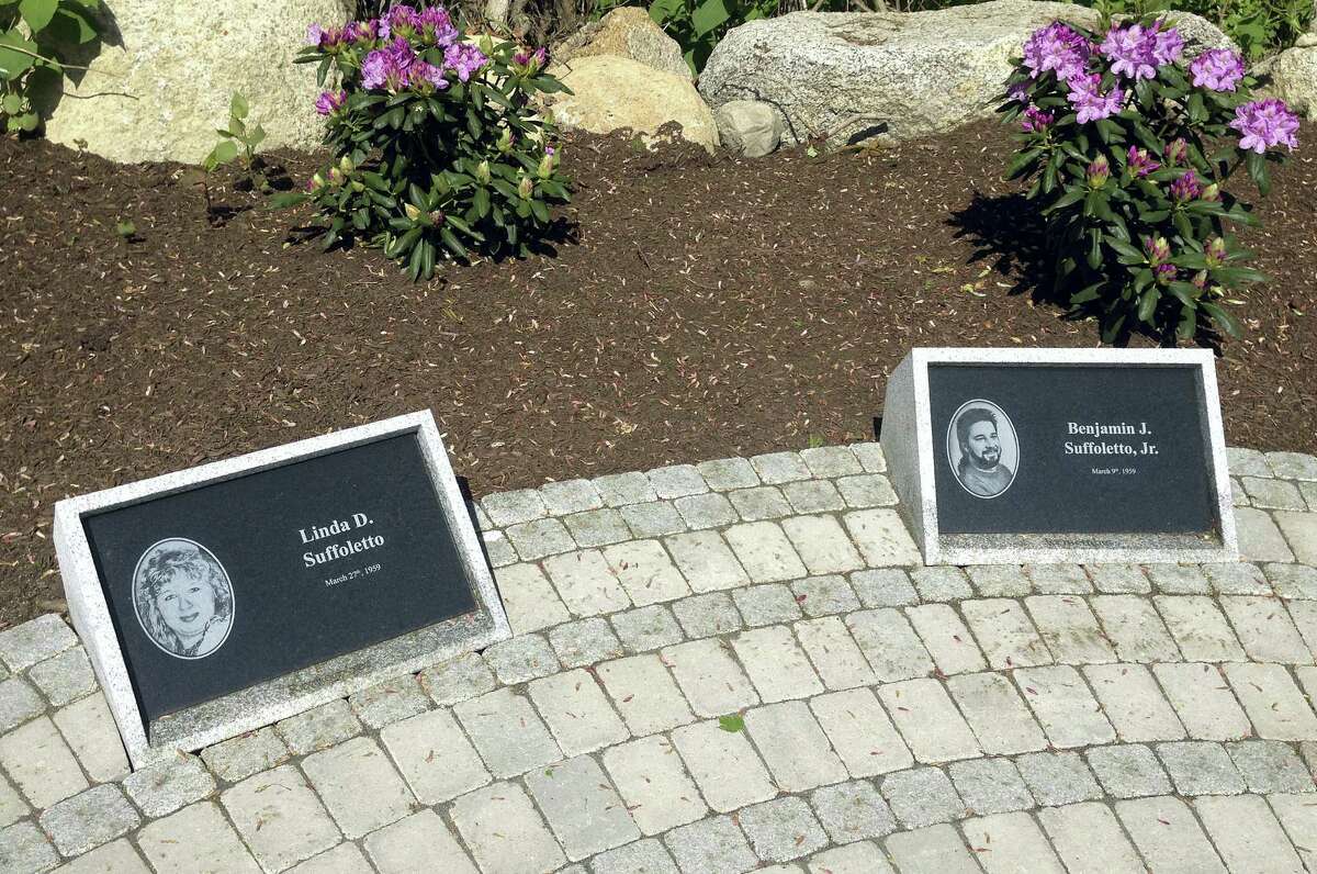 Plaques honoring victims comprise a memorial in West Warwick, R.I., on Friday, May 19, 2017, at the site of The Station nightclub fire that killed 100 and injured more than 200 people in 2003. The memorial is scheduled to open during a ceremony Sunday. (AP Photo/Michelle R. Smith)