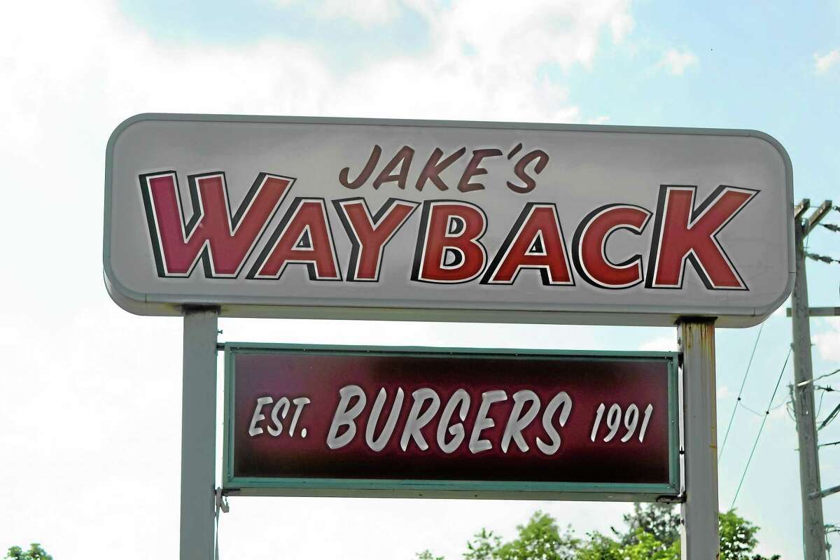 A sign for Jake’s Wayback Burgers is seen in Torrington.