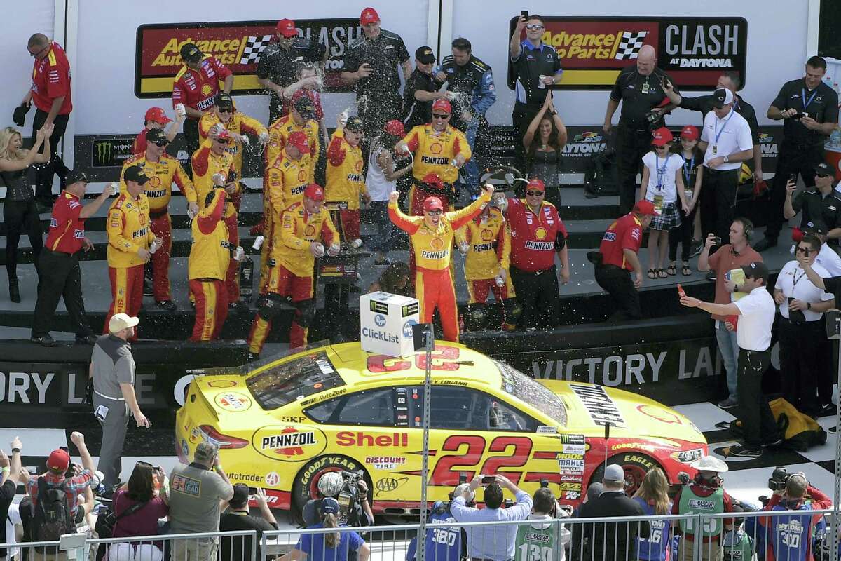 Joey Logano celebrates in Victory Lane after winning the NASCAR Clash at Daytona on Sunday.