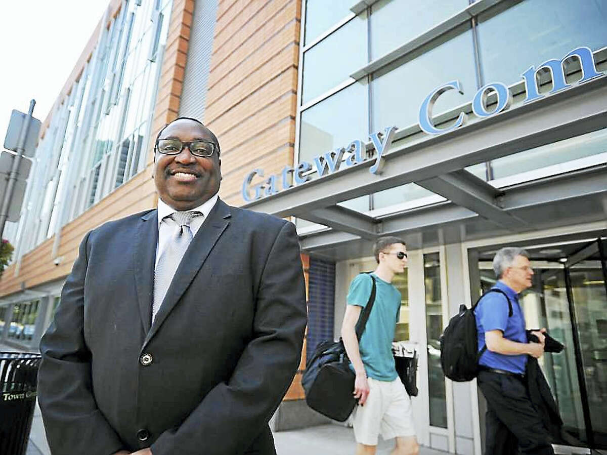 Brian A. Pounds / Hearst Connecticut MediaPaul Broadie stands outside Gateway Community College on Church Street in New Haven on June 12. Broadie is now presiding over the New Haven school along with his existing role as president of Housatonic Community College in Bridgeport