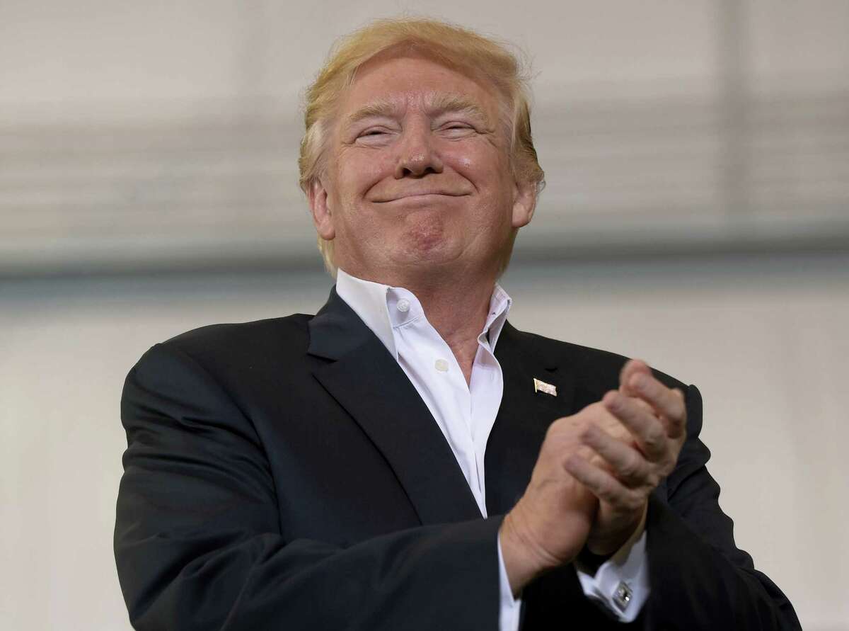 President Donald Trump smiles as he prepares to speak at his “Make America Great Again Rally” at Orlando-Melbourne International Airport in Melbourne, Fla., Saturday, Feb. 18, 2017. (AP Photo/Susan Walsh)