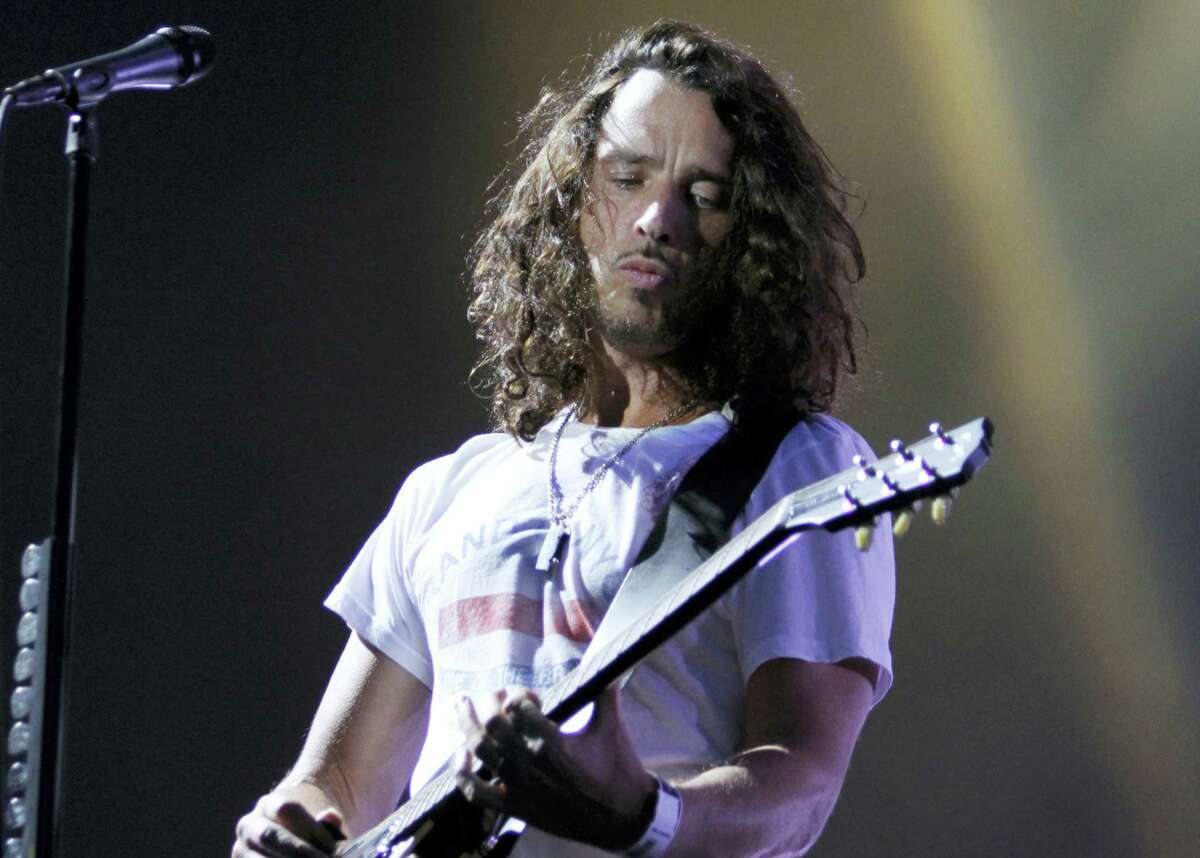In this Sunday, Aug. 8, 2010 photo, musician Chris Cornell of Soundgarden performs during the Lollapalooza music festival in Grant Park in Chicago. According to his representative, rocker Chris Cornell, who gained fame as the lead singer of Soundgarden and later Audioslave, has died Wednesday night in Detroit at age 52.