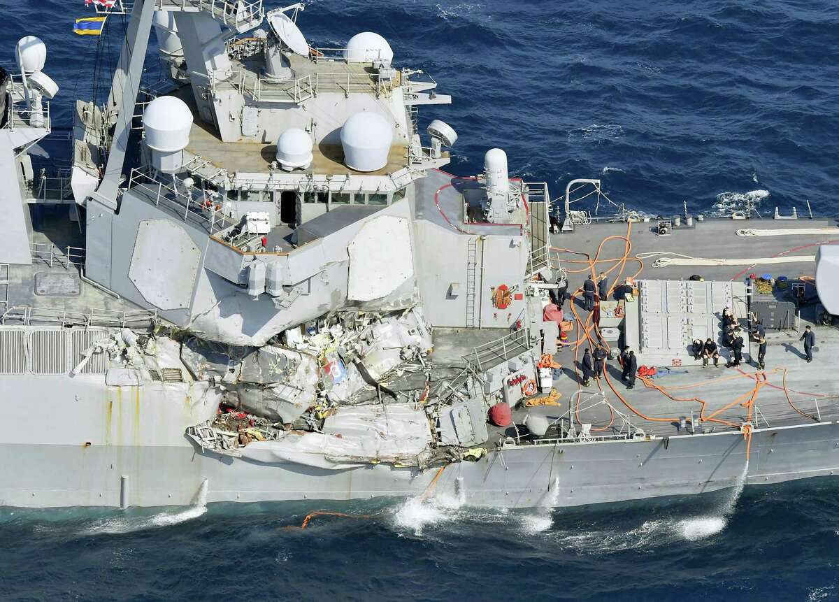 The damage of the right side of the USS Fitzgerald is seen off Shimoda, Shizuoka prefecture, Japan, after the Navy destroyer collided with a merchant ship, Saturday, June 17, 2017. The U.S. Navy says the USS Fitzgerald suffered damage below the water line on its starboard side after it collided with a Philippine-flagged merchant ship.