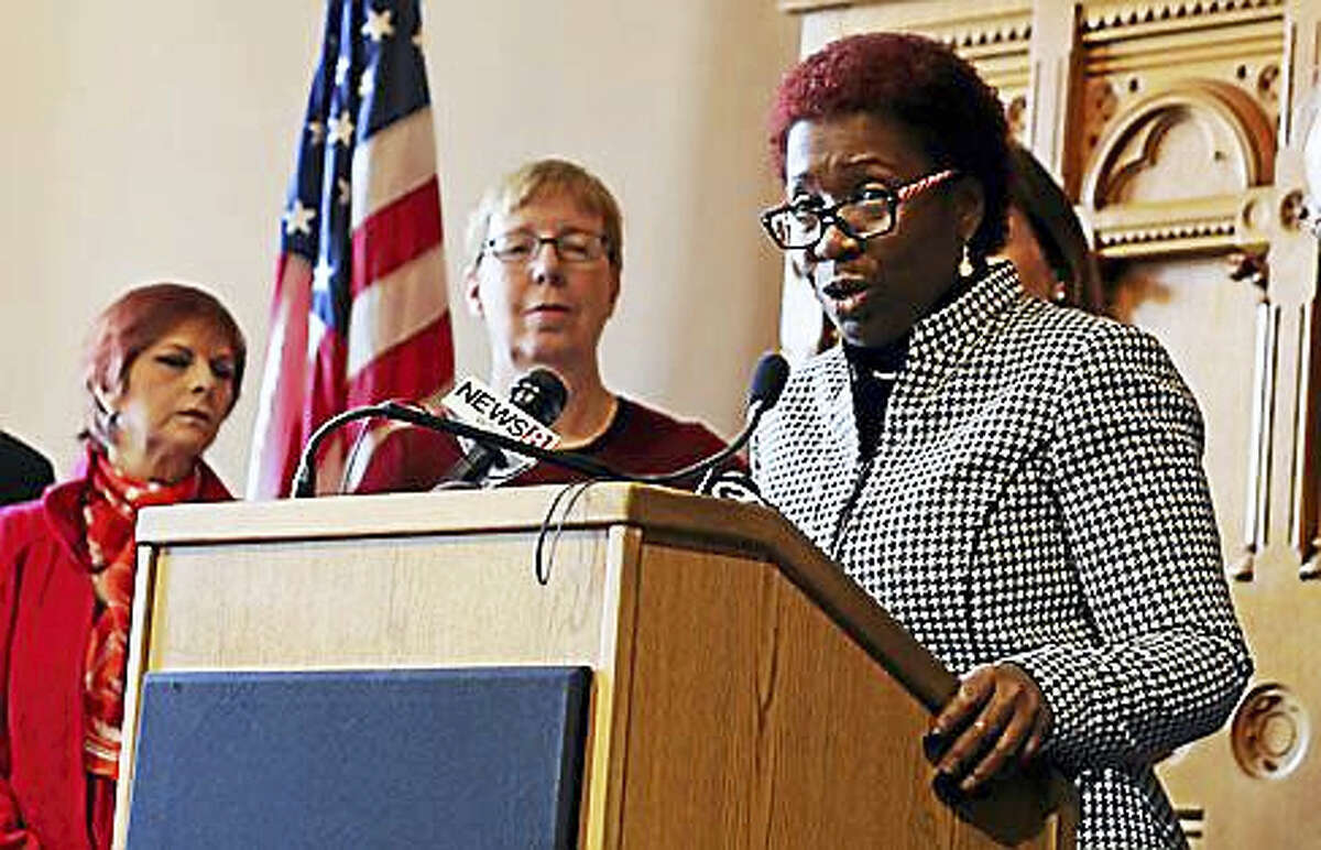 Rep. Robyn Porter, D-New Haven, speaks Thursday in Hartford to advocate for a higher minimum wage in Connecticut