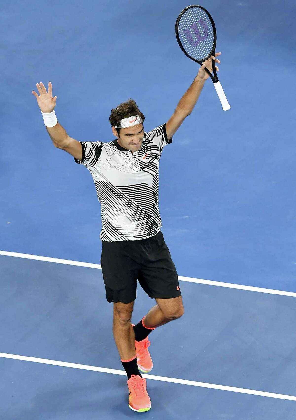 Switzerland’s Roger Federer celebrates after defeating compatriot Stan Wawrinka during their semifinal at the Australian Open tennis championships in Melbourne, Australia on Jan. 26, 2017.
