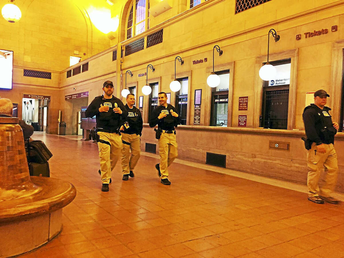 Custom and Border Patrol agents at Union Station in New Haven Wednesday.