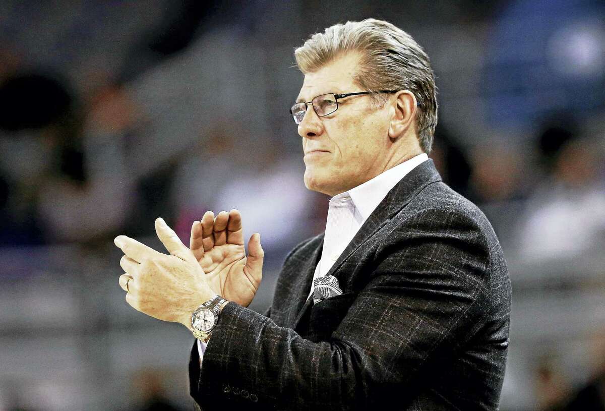 Connecticut head coach Geno Auriemma applauds his team during the second half of an NCAA college basketball game against East Carolina in Greenville, N.C., Tuesday, Jan. 24, 2017.