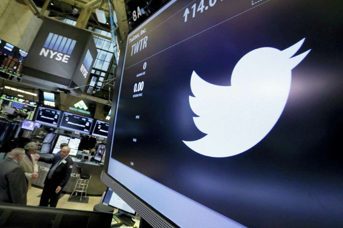 The symbol for Twitter appears above its trading post on the floor of the New York Stock Exchange.