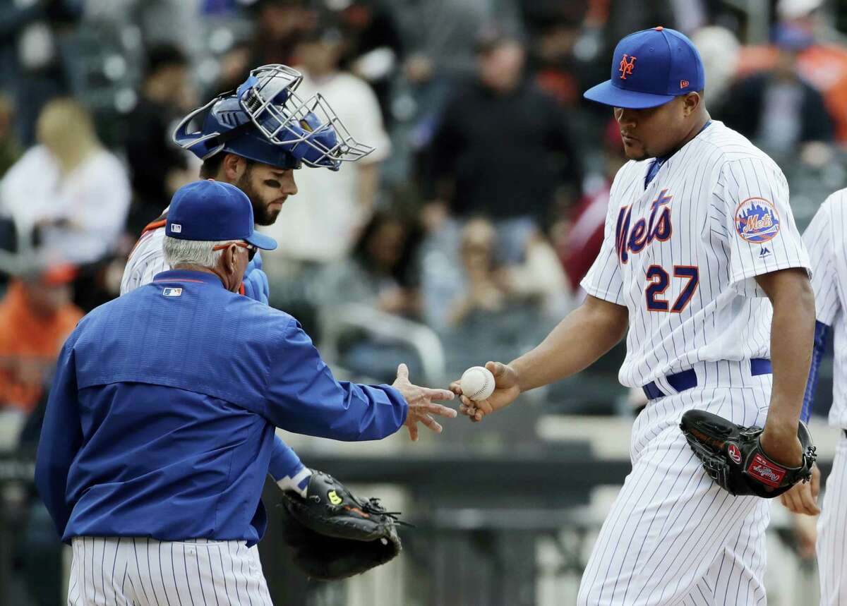 Mets closer Jeurys Familia hands the ball to manager Terry Collins on Wednesday.