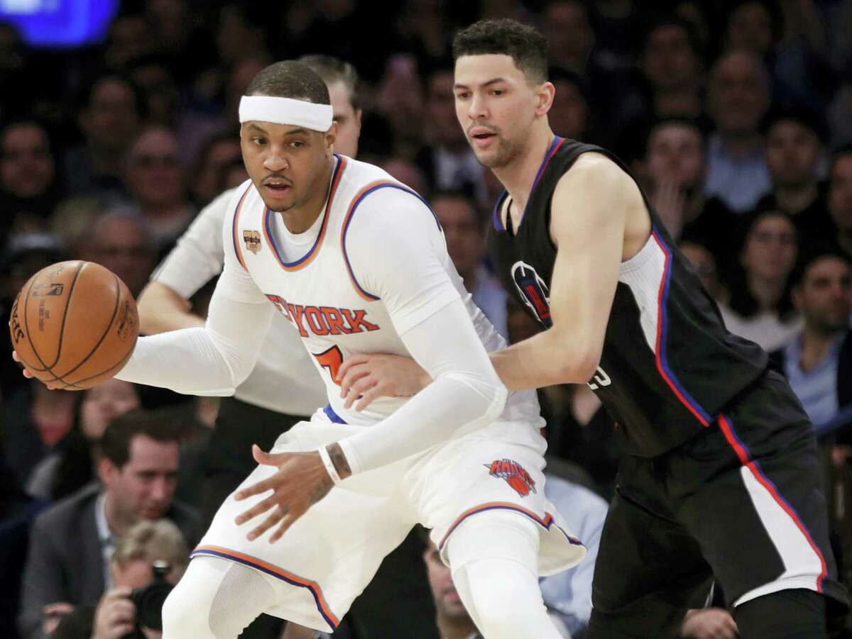 LA Clippers’ Austin Rivers (25) defends New York Knicks’ Carmelo Anthony (7) during the first half of an NBA basketball game on Wednesday, Feb. 8, 2017 in New York.