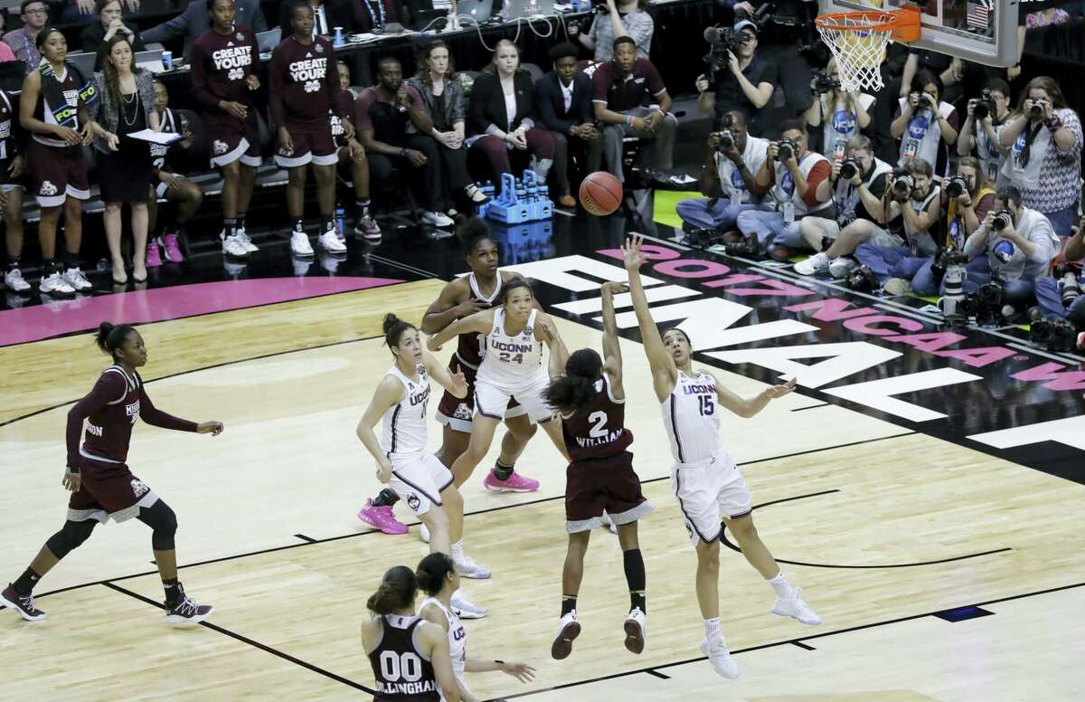 Mississippi State guard Morgan William (2) shoots the winning shot against UConn during Friday’s national semifinal at the Final Four in Dallas. Mississippi State won 66-64 in overtime.