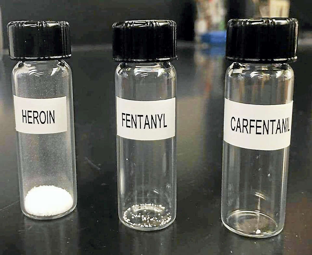 Three vials showing a lethal dose of heroin, fentanyl and carfentanil, illustrating the differences in potency.