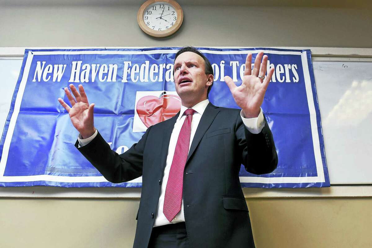 U.S. Sen. Chris Murphy speaks with New Haven teachers about opposition to education secretary nominee Betsy DeVos at the New Haven Labor Council in New Haven Friday.