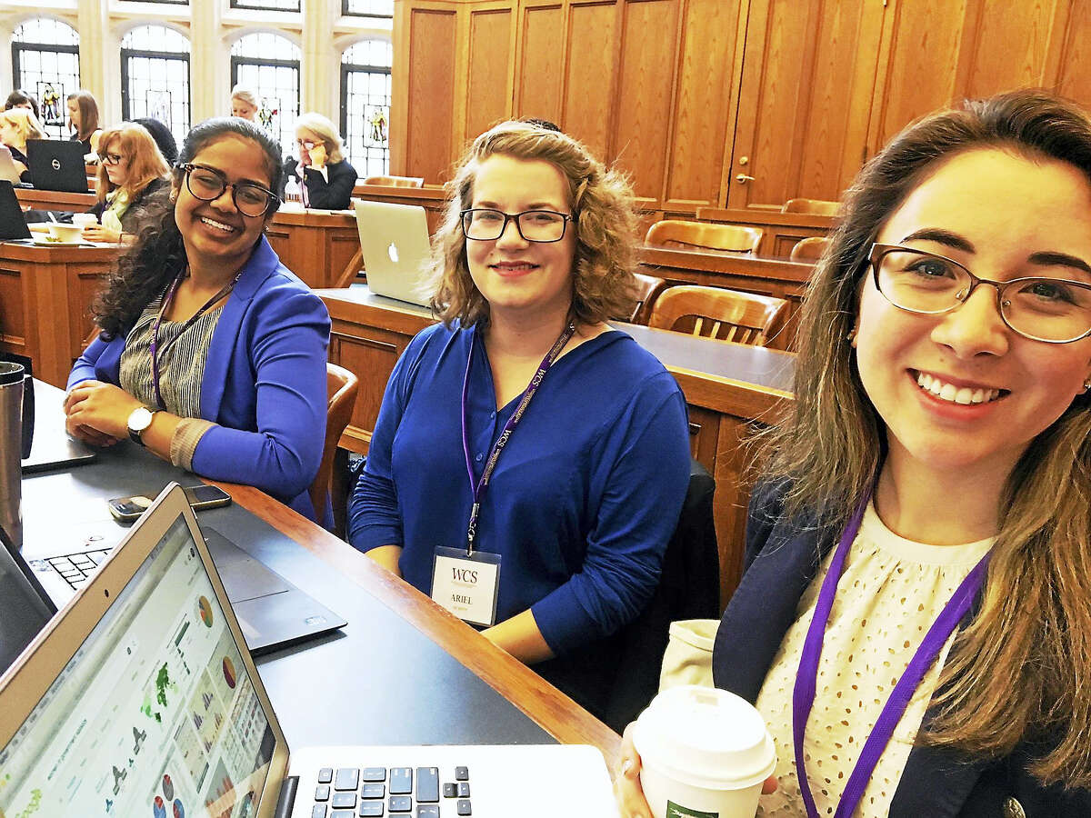 From left, Yale students Ottvia Muralteetharan, Ariel Murphy and Valentina Guerrero attend the Women’s Campaign School Monday.
