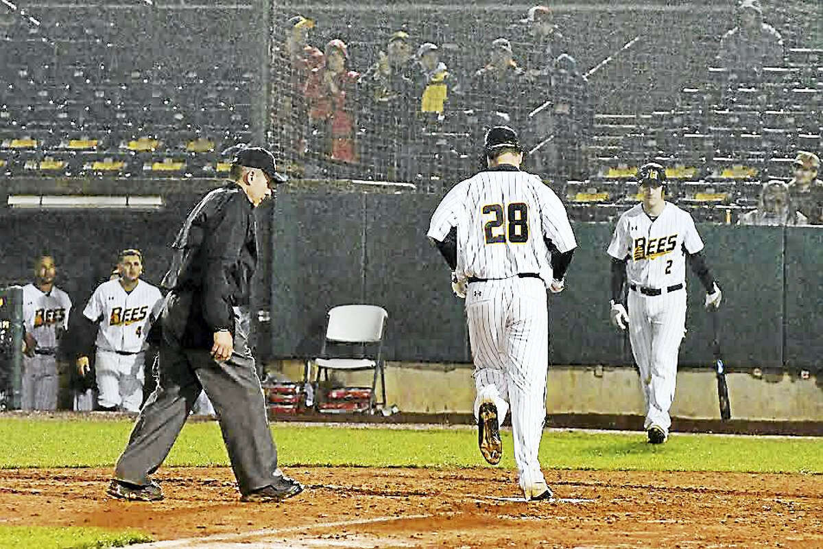 Torrington’s Conor Bierfeldt crosses home plate after hitting a home run in the New Britain Bees’ season-opener on April 21.