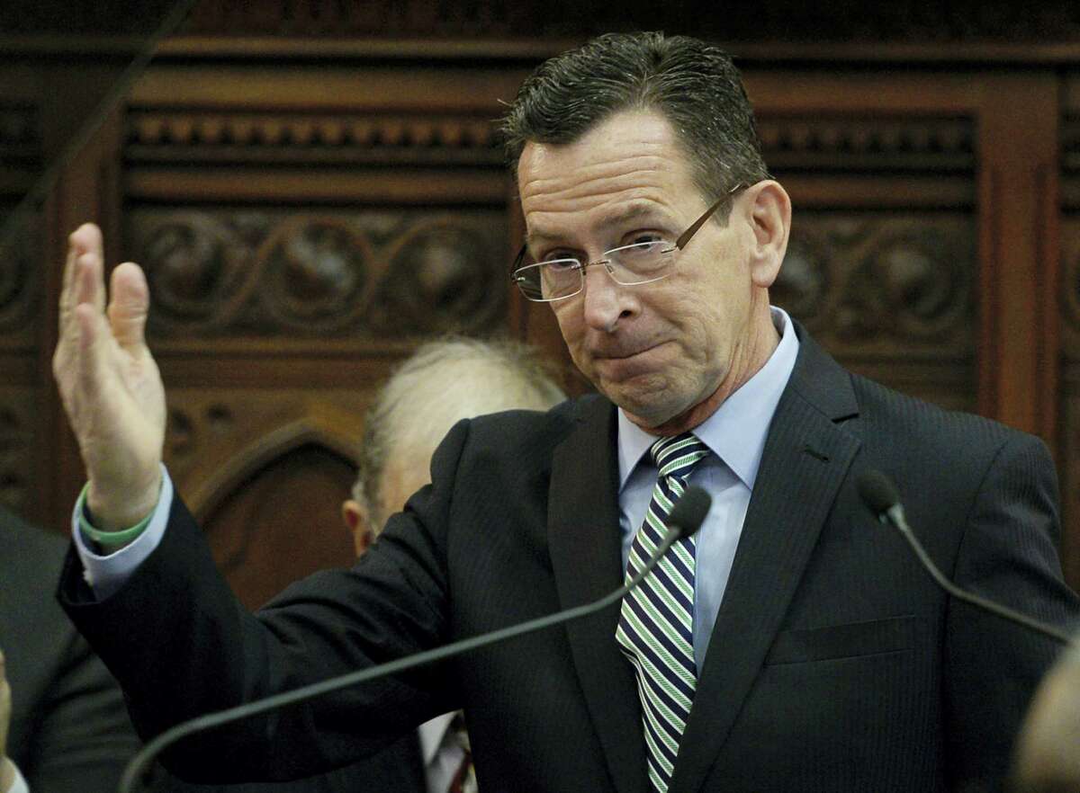 Gov. Dannel P. Malloy gestures after delivering the State of the State address during opening session at the state Capitol, Wednesday, Jan. 4, 2017, in Hartford.