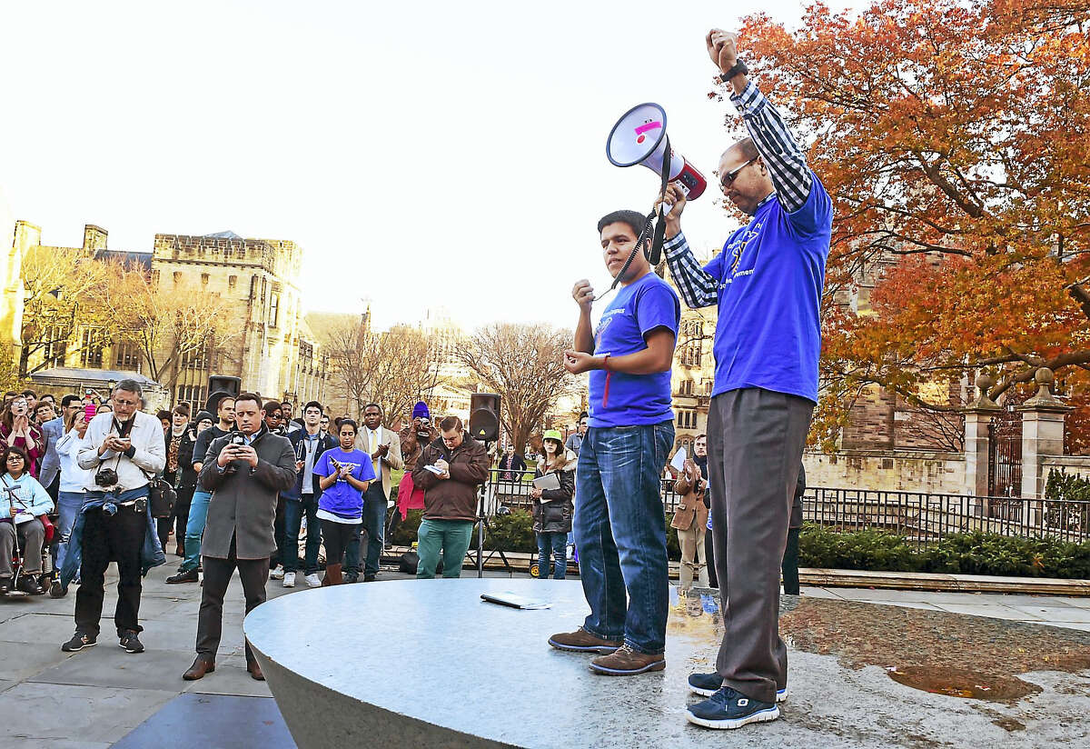 Ramon Garibaldo Valdez, a Yale graduate student in political science who is an undocumented immigrant, left, with Dax Crocker, a third-year Yale Master of Divinity student, right, call on all Yale University students to join together and declare Yale a “Sanctuary Campus” during a rally Wednesday at Cross Campus in New Haven.
