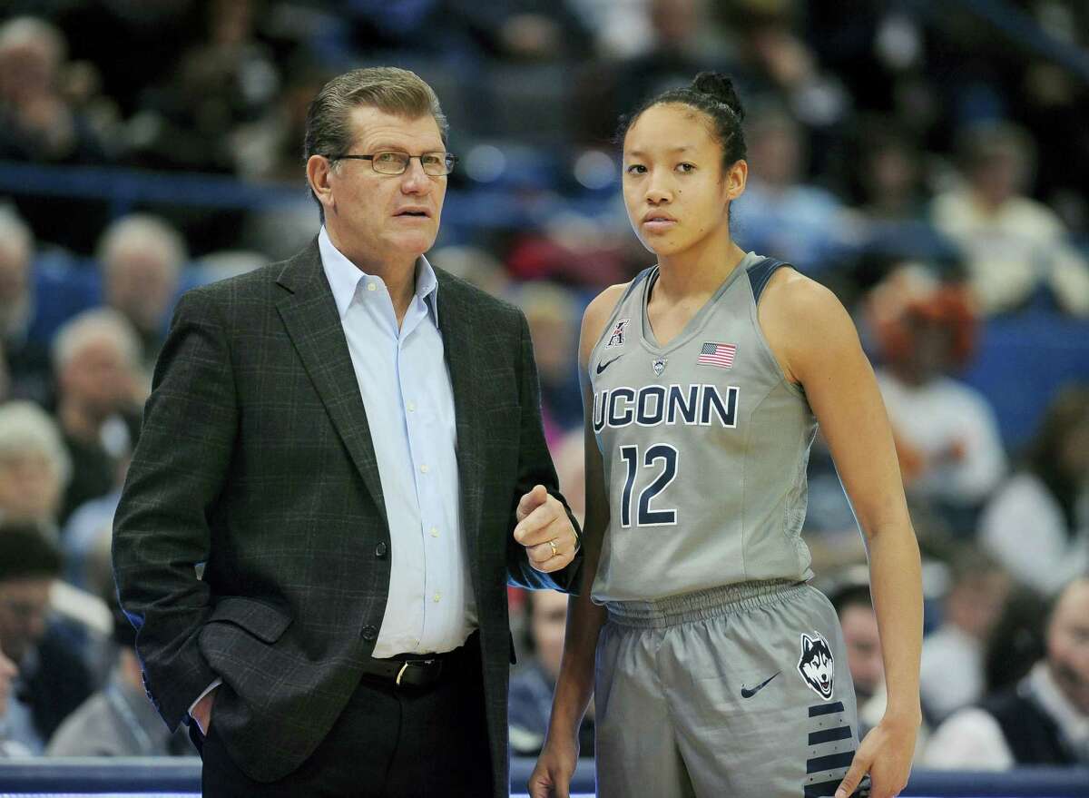 Connecticut head coach Geno Auriemma talks with Connecticut’s Saniya Chong in the second half of an NCAA college basketball game, Wednesday against UCF, Jan. 20, 2016, in Hartford, Conn. UConn won 101-51. (AP Photo/Jessica Hill)