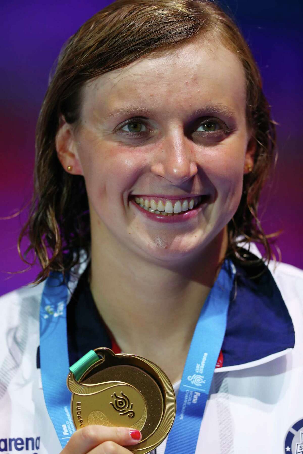 BUDAPEST, HUNGARY - JULY 23: Katie Ledecky of the United States celebrates winning the Women's 4x100m Freestyle Final on day ten of the Budapest 2017 FINA World Championships on July 23, 2017 in Budapest, Hungary (Photo by Clive Rose/Getty Images) ORG XMIT: 700047475
