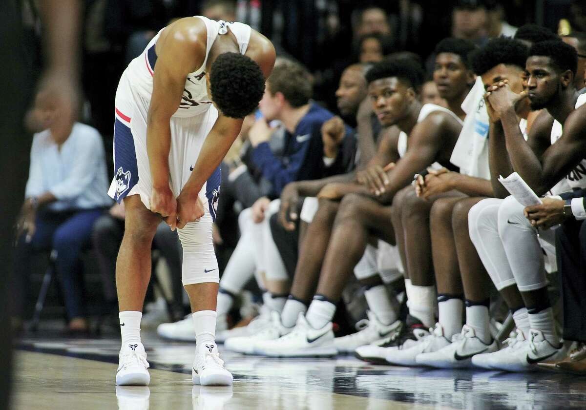 Connecticut’s Jalen Adams reacts in the final minutes of the team’s 67-58 loss against Wagner Friday at Gampel Pavilion in Storrs.