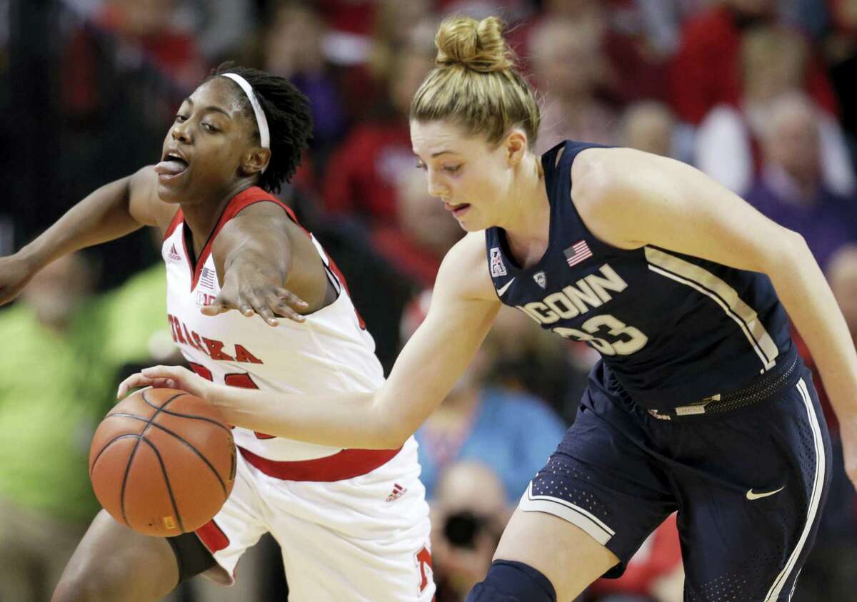 UConn’s Katie Lou Samuelson (33) steals the ball away from Nebraska’s Jasmine Cincore (34) during the first half of action Wednesday.