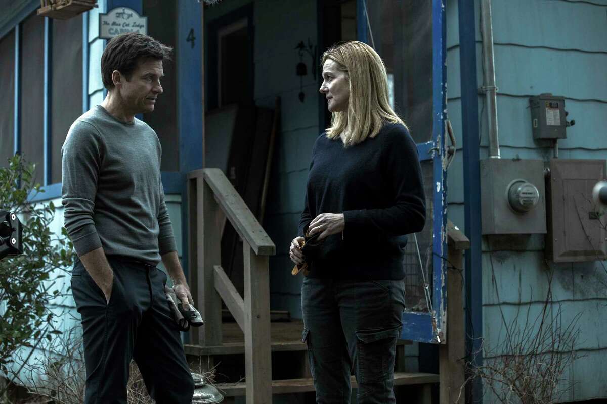 This image released by Netflix shows Laura Linney, right, and Jason Bateman in a scene from the series, "Ozark." (Jackson Davis/Netflix via AP) ORG XMIT: NYET462