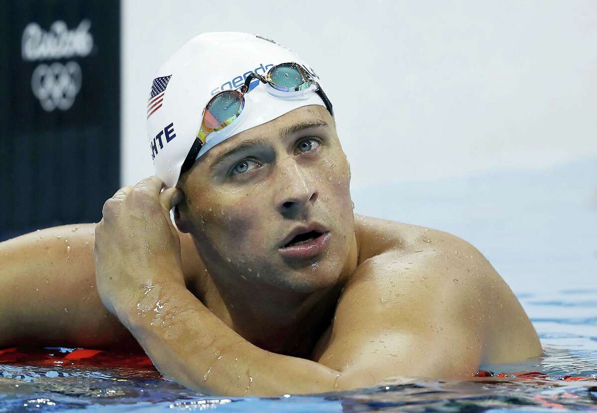 In this Aug. 9, 2016 photo, United States’ Ryan Lochte checks his time in a men’s 4x200-meter freestyle heat during the swimming competitions at the 2016 Summer Olympics in Rio de Janeiro, Brazil. During an Aug. 30, 2016 appearance on ABC’s “Good Morning America,” Lochte wouldn’t say whether he’d return to Brazil to face charges of filing a false police report over an incident at a gas station during the Games.