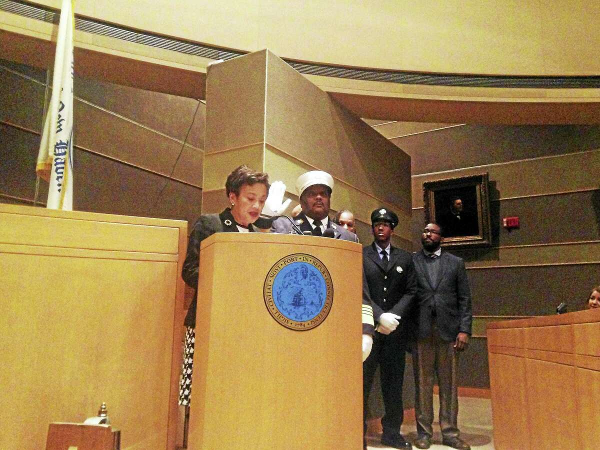 John Alston Jr. is officially sworn in as chief of the New Haven Fire Department at City Hall Thursday evening.