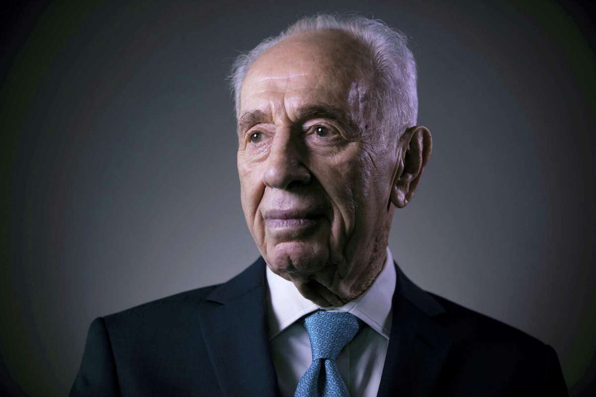 In this Monday, Feb. 8, 2016 file photo, Israel’s former President Shimon Peres poses for a portrait at the Peres Center for Peace in Jaffa, Israel. Israel’s Foreign Ministry says a long list of world leaders will attend Shimon Peres’ funeral on Friday. Spokesman Emmanuel Nahshon said Wednesday that President Obama, Bill and Hillary Clinton, Pope Francis, Prince Charles and Canadian Prime Minister Justin Trudeau are all expected. (AP Photo/Oded Balilty, File)