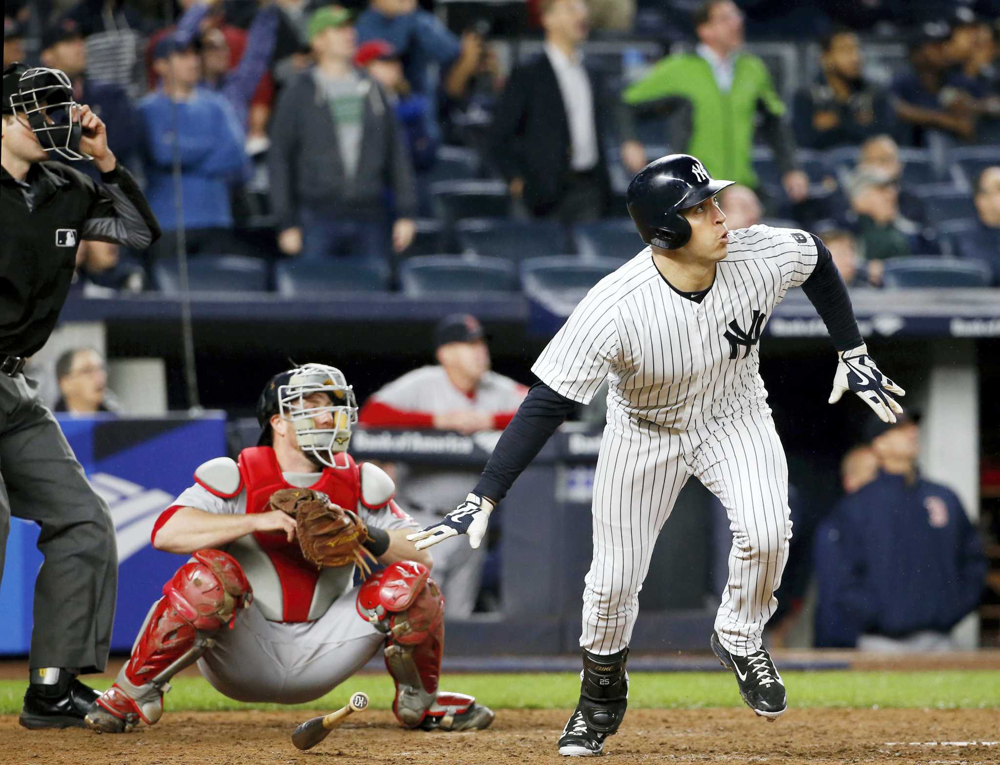 New York Yankees' Didi Gregorius watches his grand slam during the