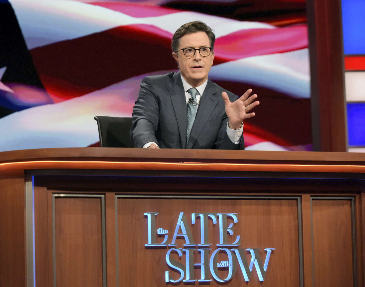 In this July 27, 2016 photo, “The Late Show with Stephen Colbert” host Stephen Colbert appears during a broadcast in New York. Lawyers representing his old show company complained to CBS after Colbert revived the character he played under his own name on “The Colbert Report,” a clueless, full-of-himself cable news host.