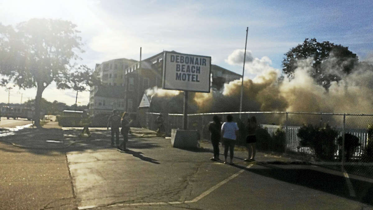 The former Debonair Beach Motel caught on fire Monday.