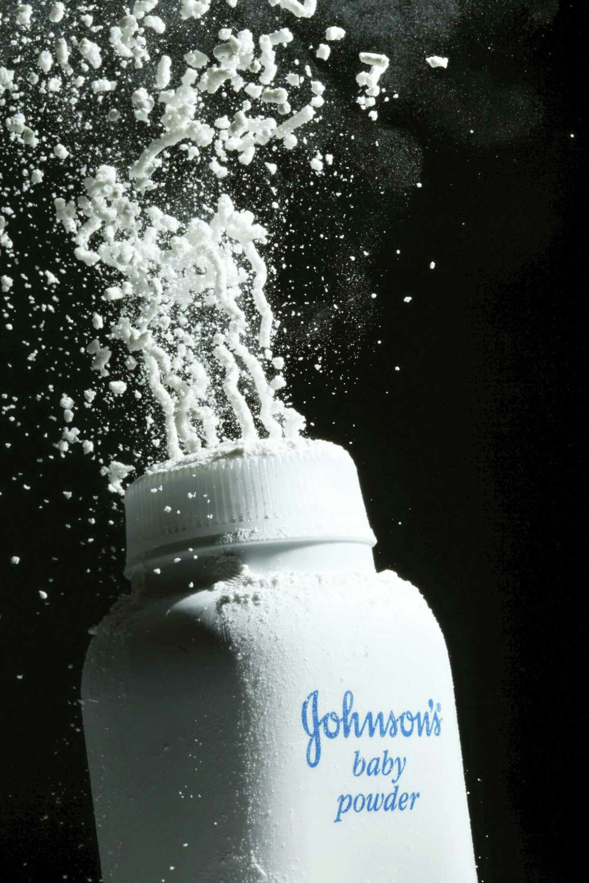Johnson’s baby powder is squeezed from its container in Philadelphia.