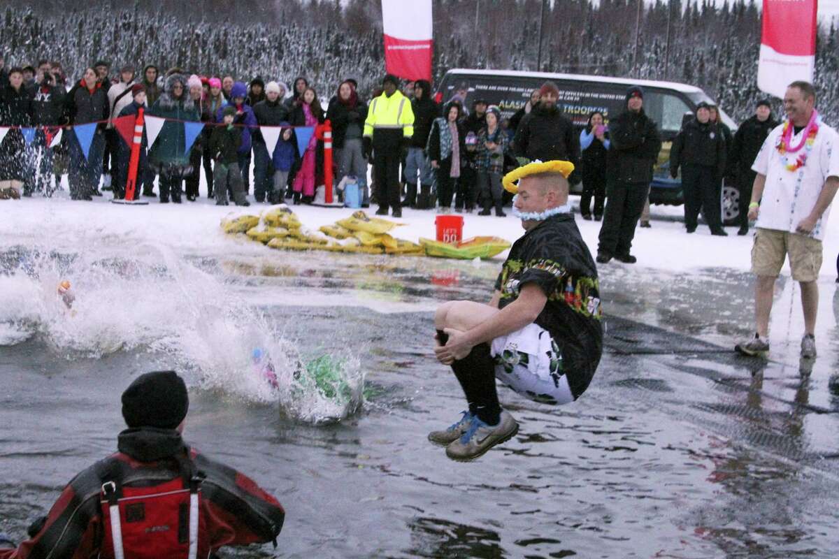 More than a thousand Alaskans took part in a polar plunge fundraiser at Goose Lake on Dec. 17, 2016 in Anchorage, Alaska. The plunge was a benefit for Special Olympics Alaska, and has raised more than $2 million for the organization in the eight years it has been held.