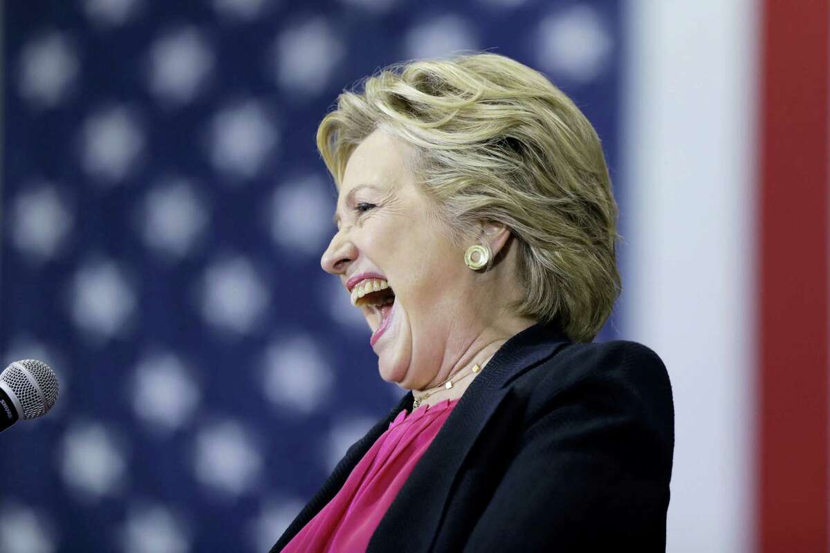 Democratic presidential candidate Hillary Clinton laughs during a campaign stop at Wake Technical Community College in Raleigh, N.C., Tuesday, Sept. 27, 2016.