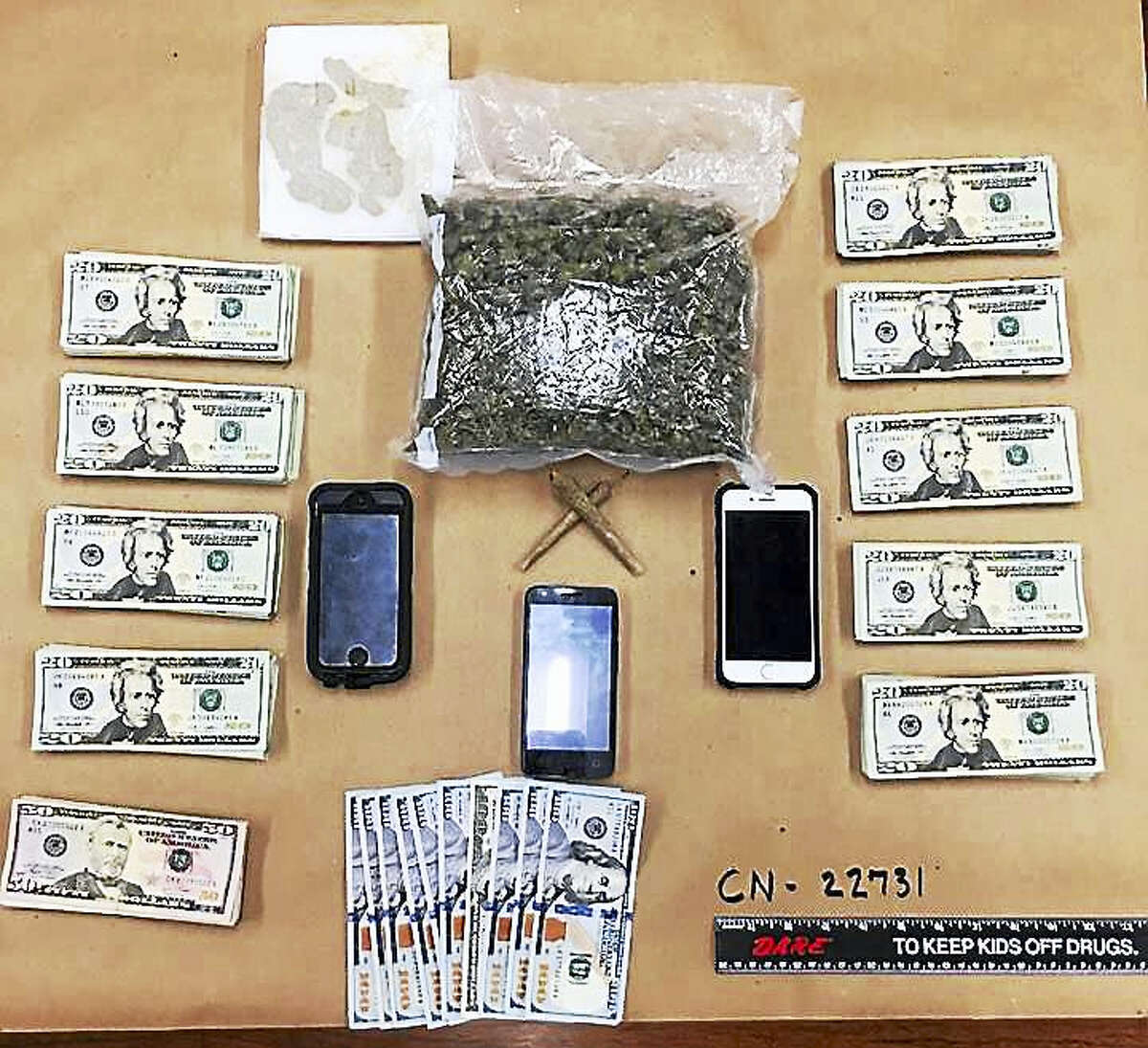 Two men are facing charges after North Haven police say they were found with 11 ounces of marijuana, hash oil and thousands of dollars in cash during a traffic stop.
