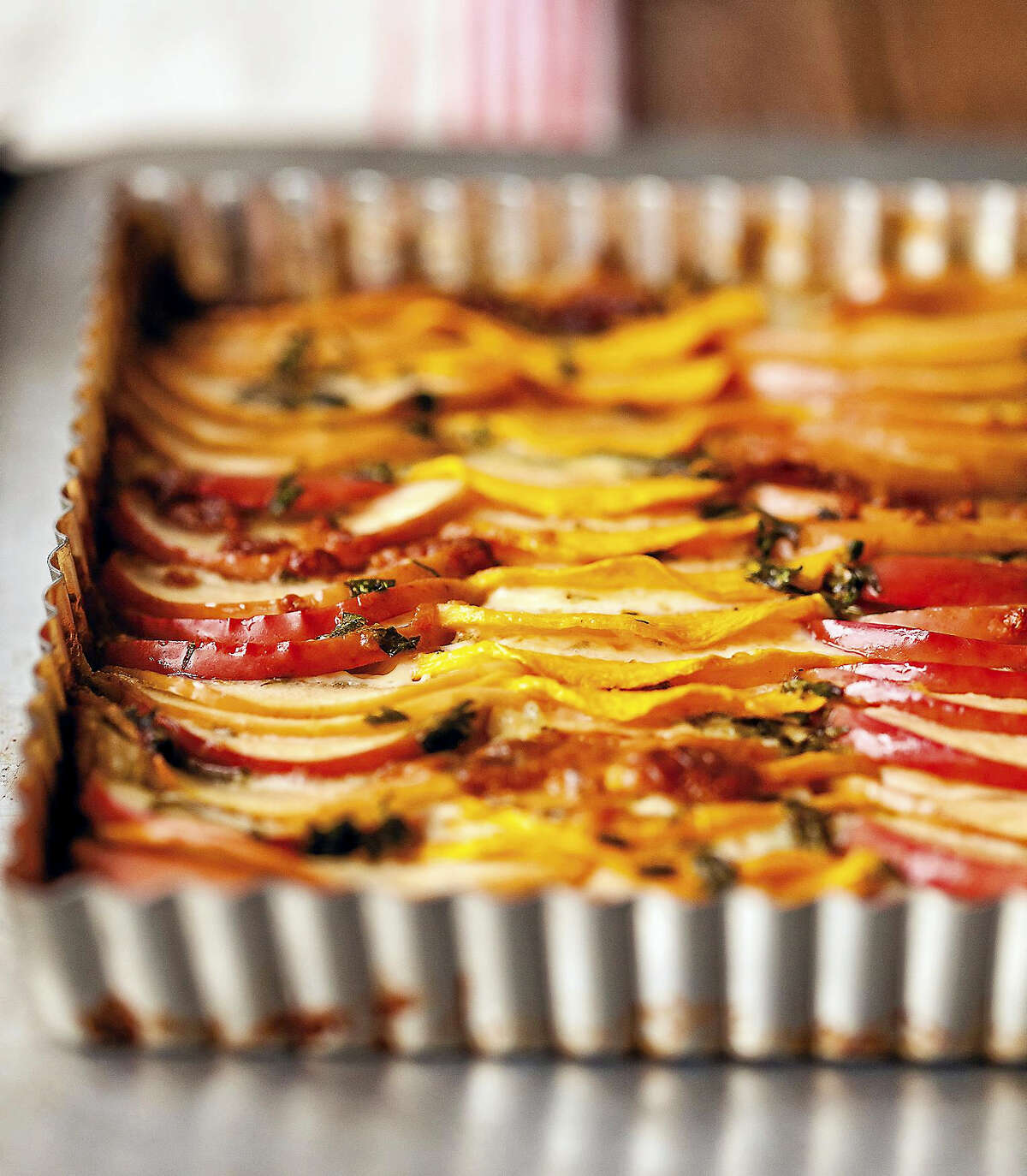 The beauty of apple & winter squash tian is in the presentation.
