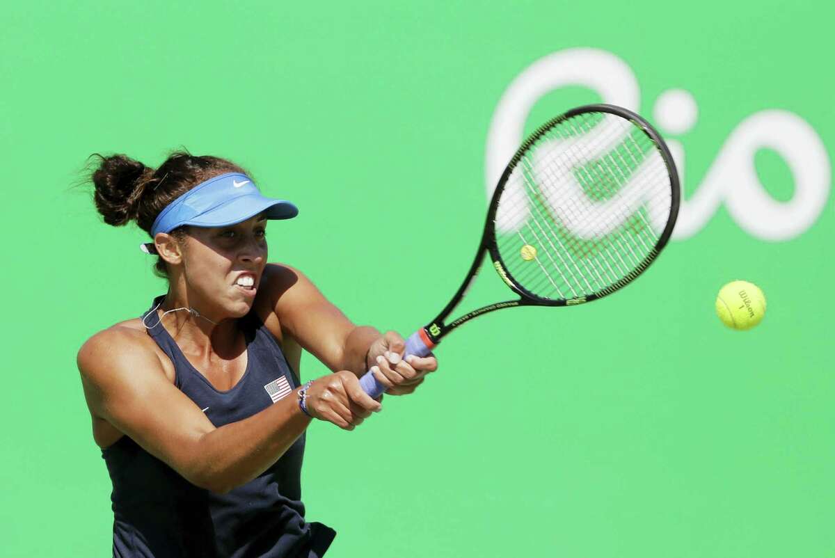 In this Aug. 13, 2016 photo, Madison Keys of the United States hits a return to Petra Kvitova, of the Czech Republic, during their women’s singles bronze-medal tennis match at the Summer Olympics in Rio de Janeiro, Brazil.