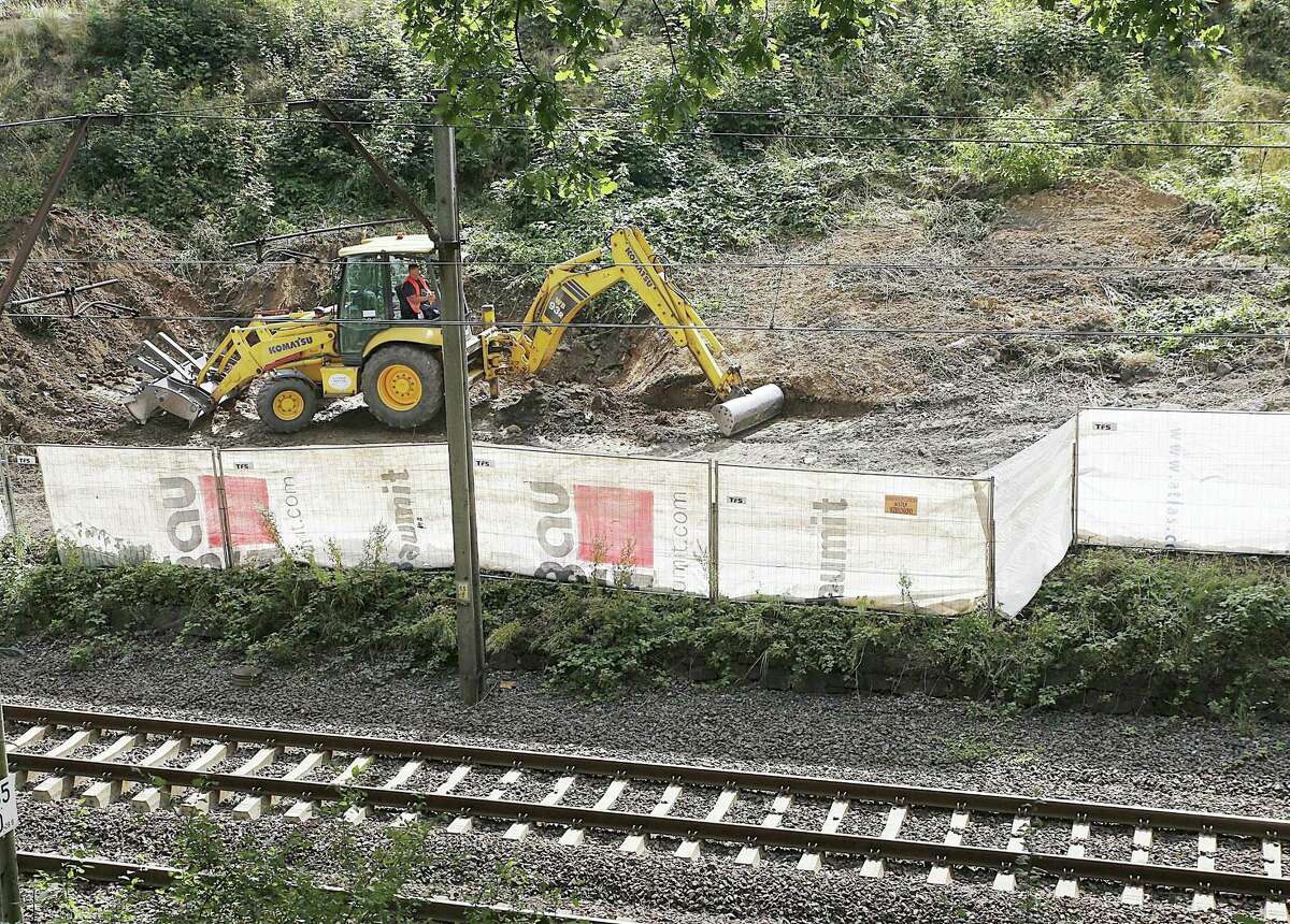 In this Aug. 16, 2016, file picture heavy machinery begins the search, the work of explorers hoping to find a legendary Nazi train laden with treasure and armaments in Walbrzych, Poland. Explorers’ great hopes for finding a legendary Nazi “gold train” in Poland appeared dashed Wednesday Aug. 24, 2016, when, after digging extensively, they admitted they have found “no train, no tunnel” at the site.
