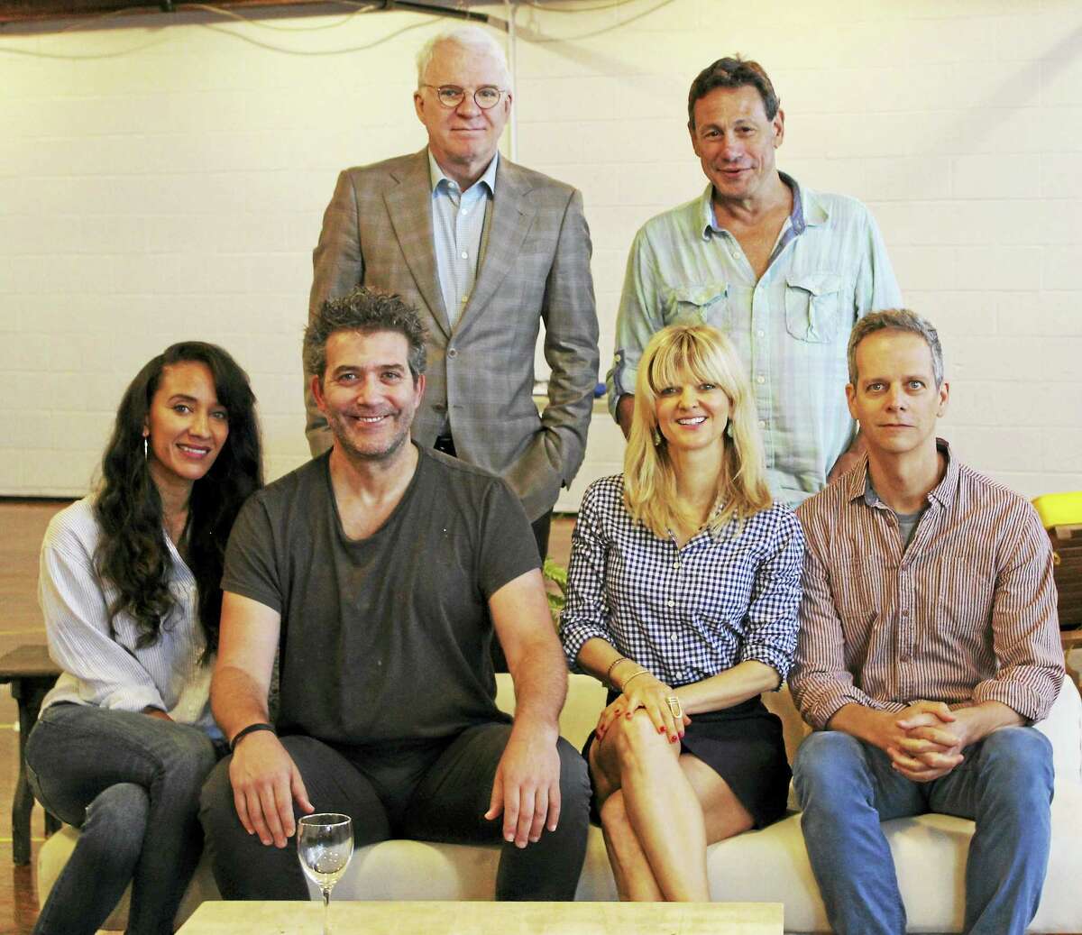 Steve Martin, top left, stands with Gordon Edelstein over “Meteor Shower” actors, from left, Sophina Brown, Craig Bierko, Arden Myrin and Patrick Breen.