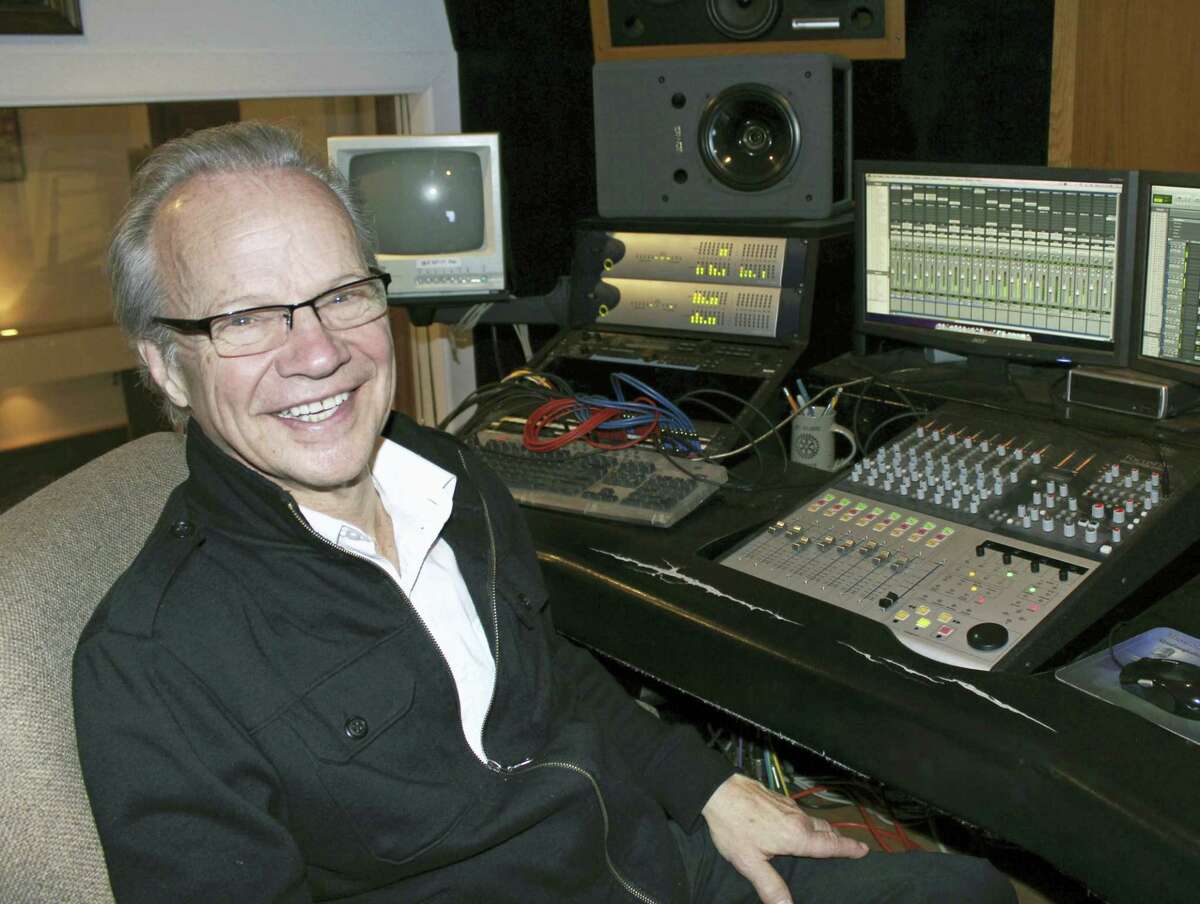 In this Dec. 18, 2013 photo, Bobby Vee poses at the studio console at his family’s Rockhouse Productions in St. Joseph, Minn. Vee, whose rise toward stardom began as a 15-year-old fill-in for Buddy Holly after Holly was killed in a plane crash, died Oct. 24, 2016 of complications from Alzheimer’s disease. He was 73.