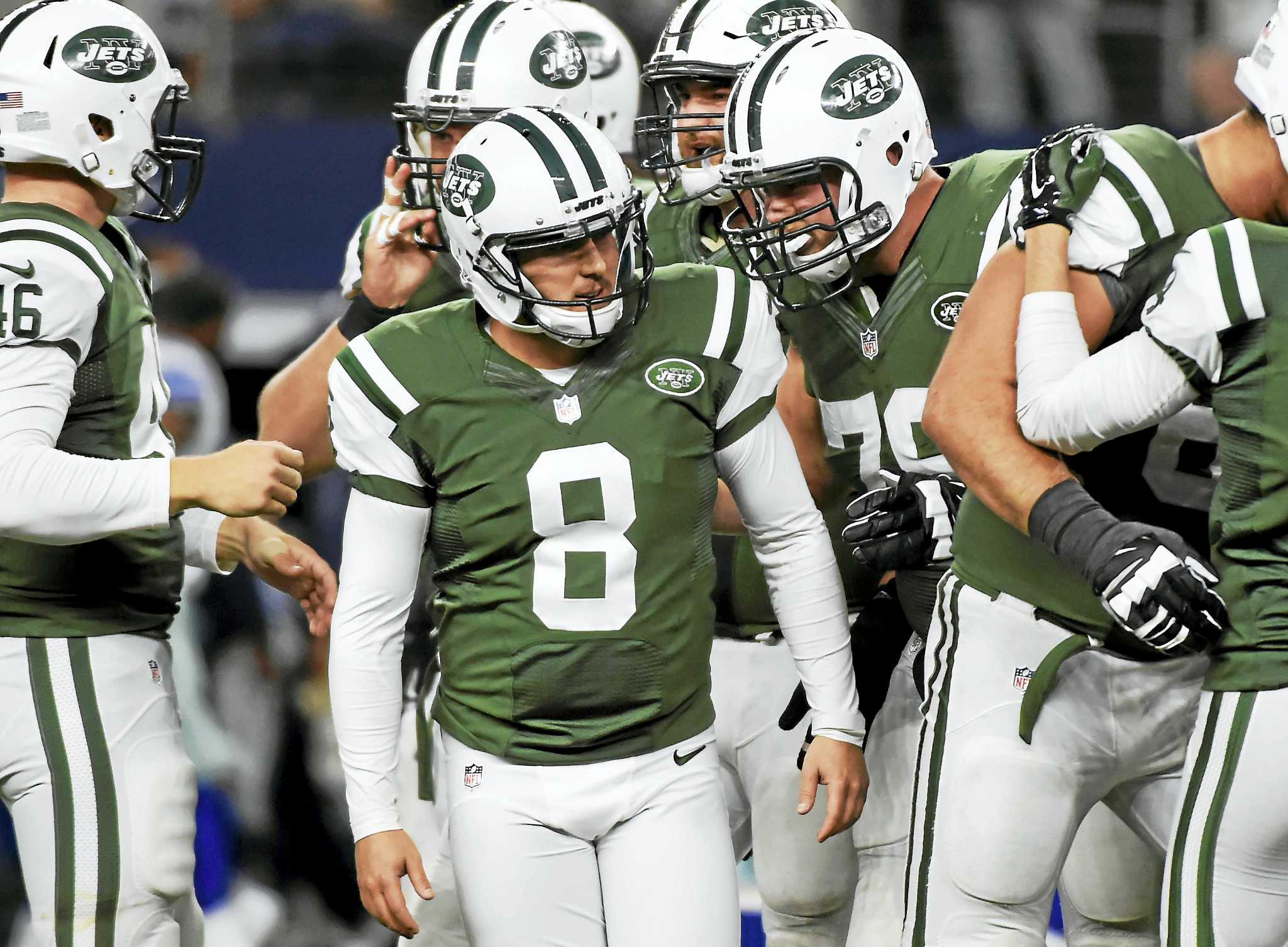 Kicker Randy Bullock of the New York Jets kicks off against the