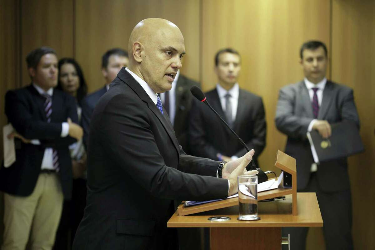 Brazil’s Justice Minister Alexandre de Moraes , speaks on the arrest of 10 people who allegedly pledged allegiance to the Islamic State group on social media and discussed possible attacks during the Rio de Janeiro Olympics, at the Ministry of Justice, in Brasilia, Brazil. However “they were complete amateurs and ill-prepared” to actually launch an attack, Moraes said. “A few days ago they said they should start practicing martial arts, for example.” Moraes says two more suspects are being sought.