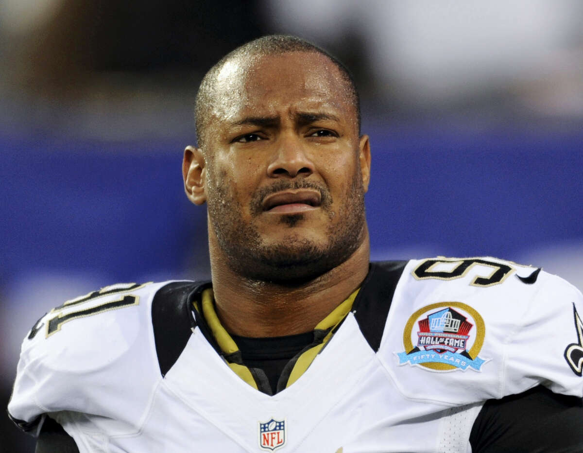 In this Dec. 9, 2012 photo, New Orleans Saints defensive end Will Smith appears before an NFL football game against the New York Giants in East Rutherford, N.J.