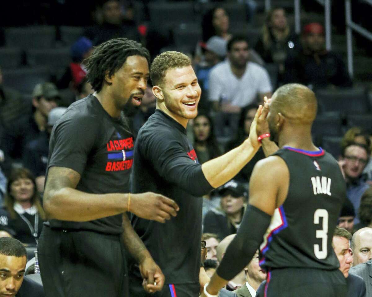 Los Angeles Clippers center DeAndre Jordan, forward Blake Griffin (#32) and guard Chris Paul (#3) in an NBA basketball game between Los Angeles Clippers and New Orleans Pelicans on Dec. 10, 2016 in Los Angeles.