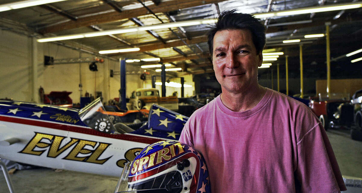 In this July 2016 photo provided by Weiward, Eddie Braun poses for a photo at a storage facility in Chatsworth, Calif. Fueled by the memory of the late daredevil Evel Knievel, Hollywood stuntman Braun plans to strap into a steam-powered rocket cycle on Sept. 17, for his most death-defying role yet.