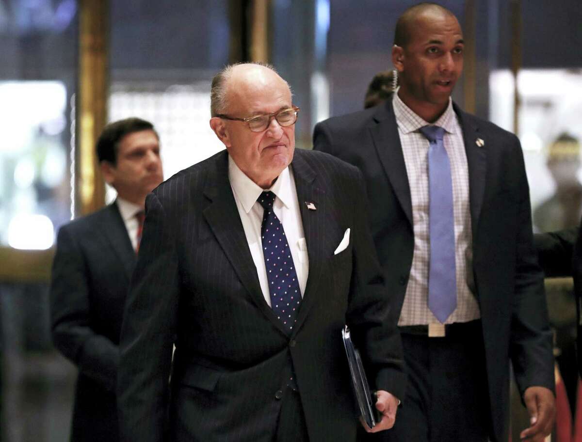 Former New York Mayor Rudy Giuliani arrives at Trump Tower in New York.