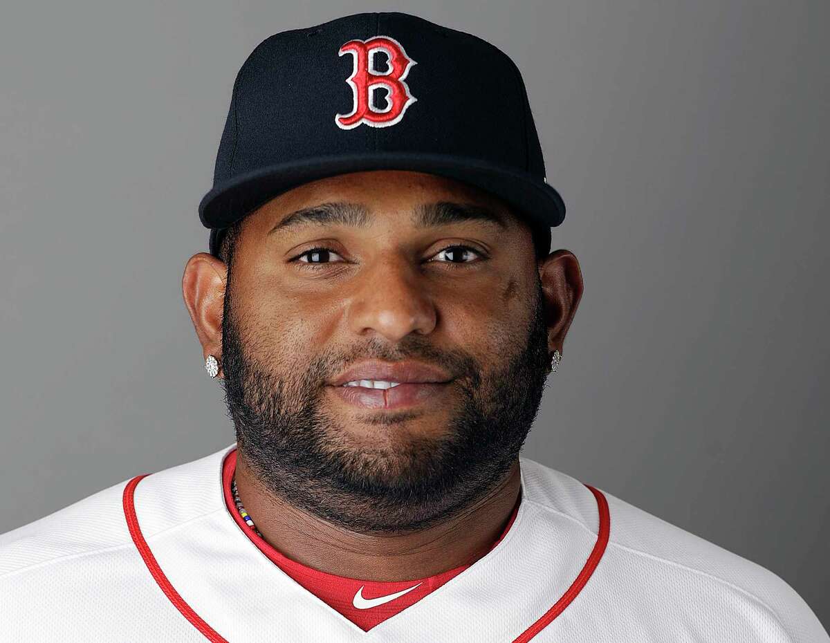 FILE - This Feb. 19, 2017, file photo shows Pablo Sandoval of the Boston Red Sox baseball team. On Friday, July 14, 2017, the Red Sox announced that Sandoval had been designated for assignment after being activated from the 10-day disabled list. (AP Photo/David Goldman, File)